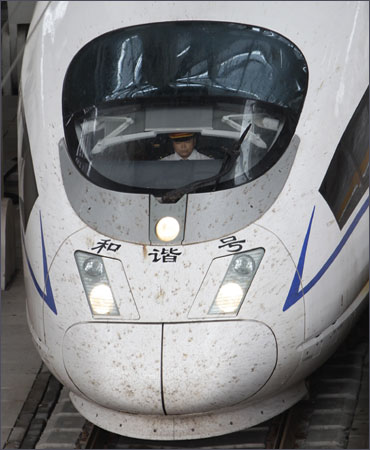 A driver is seen inside a CRH (China Railway High-speed) Harmony bullet train at Beijing South Railway Station.