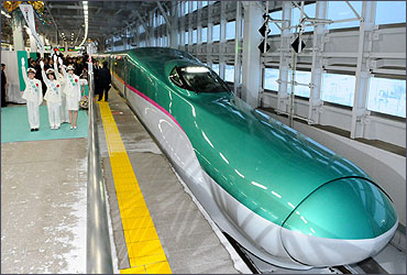 The Hayabusa shinkansen or bullet train departs from Aomori station.