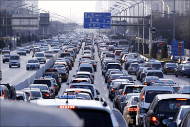 Vehicles are seen in a traffic jam during weekday rush hour in Beijing.