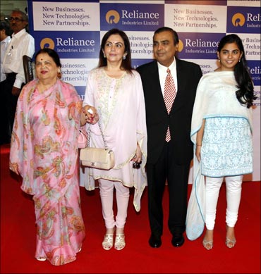 (From Left) Kokilaben Ambani, Nita Ambani, Reliance Industries chairman Mukesh Ambani and his daughter Isha at the 37th AGM of Reliance Industries Ltd.