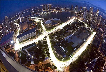 An aerial view shows the illuminated Marina Bay street circuit of the Singapore Formula 1 Grand Prix