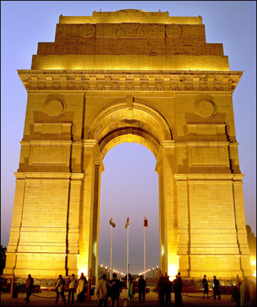 People walk near the historic India Gate.