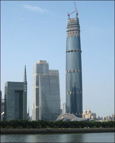 Towers in Guangzhou's CBD (left-center) with IFC/West Tower (right) and Guangzhou Opera House (front).