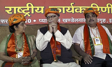 BJP leaders Sushma Swaraj, L K Advani and Nitin Gadkari.