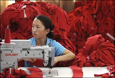 An employee works at a garment factory in Wuhu.