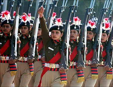 Indian policewomen march during the rehearsal for India's Republic Day parade.