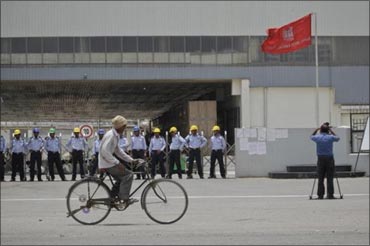 Private security guards outside the Manesar plant.