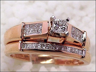 Princess cut diamond bridal set set in 14k pink-rose gold.