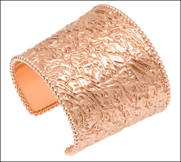 A pink gold cuff.