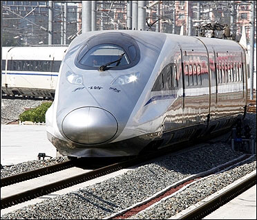 A new high-speed train arrives at the Beijing-South railway station.