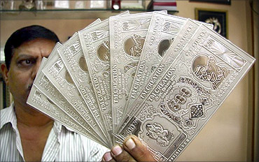 Rupee notes in silver.