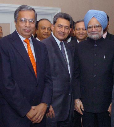 Gupta with Prime Minister Manmohan Singh.