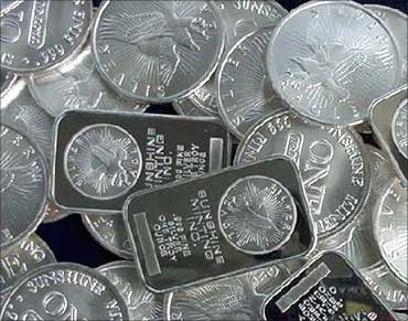Silver at 31-year high; gold touches Rs 21,420/10 gm