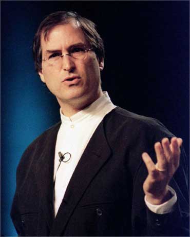 Steve Jobs, seen in a January 1997 file photo, rejoined Apple after the computer company purchased his NeXT software firm.