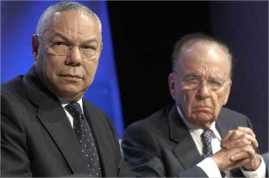 Former US Secretary of State Colin Powell (L) and Murdoch.