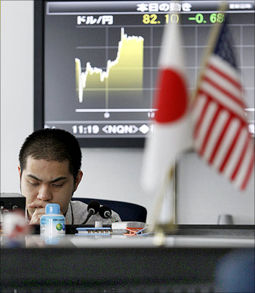 Japan is bogged down by debt and falling exports.