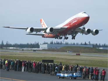 The 747-8 Intercontinental takes off from Paine Filed in Everett, Washington.