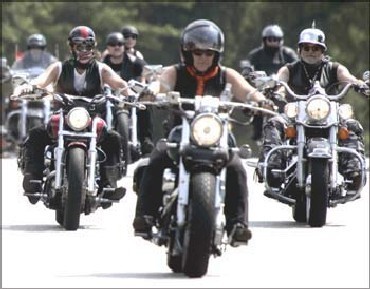 Bikers ride their Harley-Davidsons