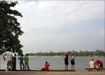 Tourists visit Fort Kochi beach in Kochi.