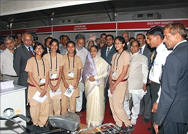 Students with President Pratibha Patil at the NIF exhibition.