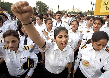 AI pilots take part in a protest march in Mumbai.