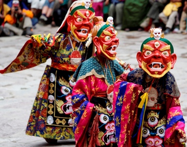 Lamas dressed in costumes perform a dance during the Hemis Tsechu festival at the Hemis monastery in Ladakh.