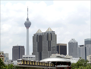 A light rail transit train is seen in downtown Kuala Lumpur.