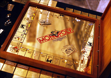 An 18-karat solid gold Monopoly set covered with hundreds of precious gemstones.