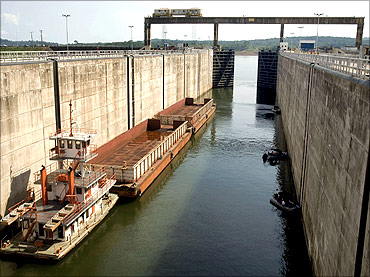 A cargo barge enters a lock of the Tucurui dam on the Tocantins River.