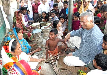 Muhammad Yunus with villagers.