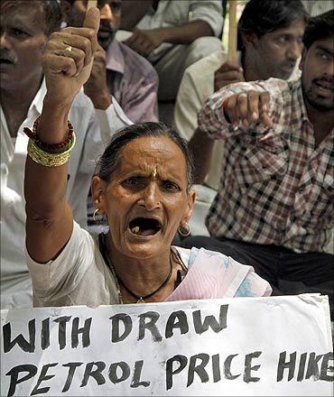 An activist from the Communist Party of India (CPI) shouts slogans.