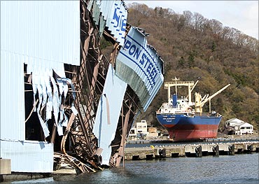 Damaged Nippon Steel's facility (L) and a cargo ship swept by ashore by Tsunami.