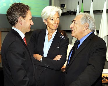 (L-R) Timothy Geithner, Christine Lagarde and Strauss-Kahn chat prior to a meeting in April.