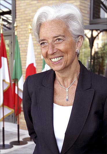 France's President Nicolas Sarkozy (R) and France's Finance and Economy Minister Christine Lagarde.