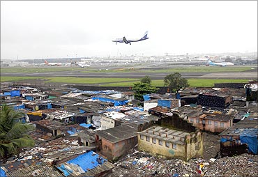 A plane about to land at Mumbai International Airport.