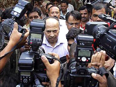 Gautam Doshi, a group managing director of Reliance ADA group, leaves a court in New Delhi.