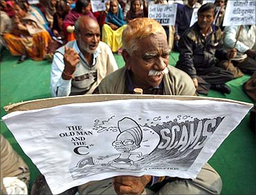 People protest against scams.