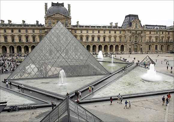 The general view of the Louvre Museum with its glass Pyramid entrance designed by Chinese-born US Architect I.M. Pei.