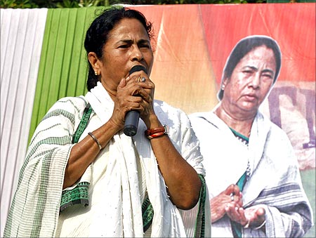 Mamata Banerjee addresses her supporters during an election campaign rally.
