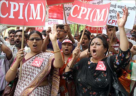 Activists from the Communist Party of India-Marxist (CPI-M) shout slogans during a protest against the hike in fuel prices in New Delhi.