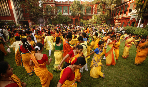 Students from Rabindra Bharati University dance as they celebrate Basanta Utsab, or Spring Festival, in Kolkata.