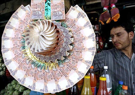 A garland made of rupee notes.