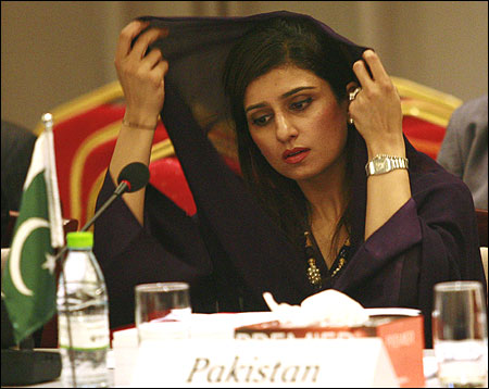 Pakistan's Foreign Minister Khar adjusts her scarf during the SAARC countries foreign ministers meeting in Addu.