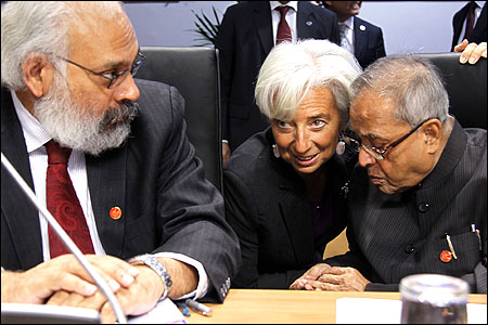 From L-R: RBI deputy Governor Subir Gokarn, IMF head Christine Lagarde and Finance Minister Pranab Mukherjee.