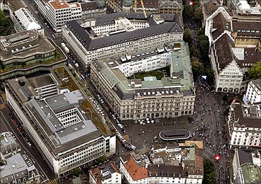 An aerial view shows the headquarters of Swiss banks UBS (front L) and Credit Suisse (C) at the Paradeplatz square in Zurich.