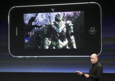 Mike Capps, president of Epic Games, speaks about games on the iPhone at Apple headquarters.
