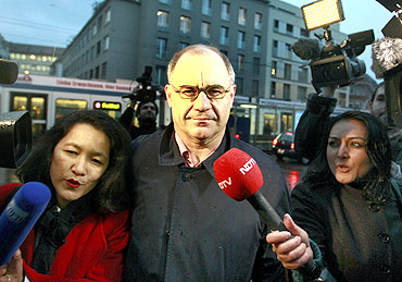 Members of the media surround former Swiss private banker Rudolf Elmer in Zurich.