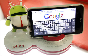 An Android smartphone displays the Google website.