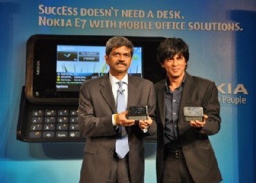 D Shivakumar of Nokia India with Shahrukh Khan at the launch of Nokia's dual SIM phones