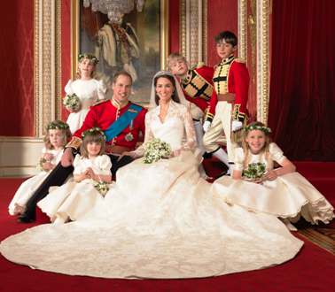 Britain's Prince William and his bride Catherine pose for a  photograph, with their bridesmaids and pageboys, on the day of their wedding, in the throne room at Buckingham Palace.